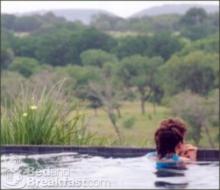 Can't you see yourself lounging in your hot tub, overlooking the Hill Country valleys?