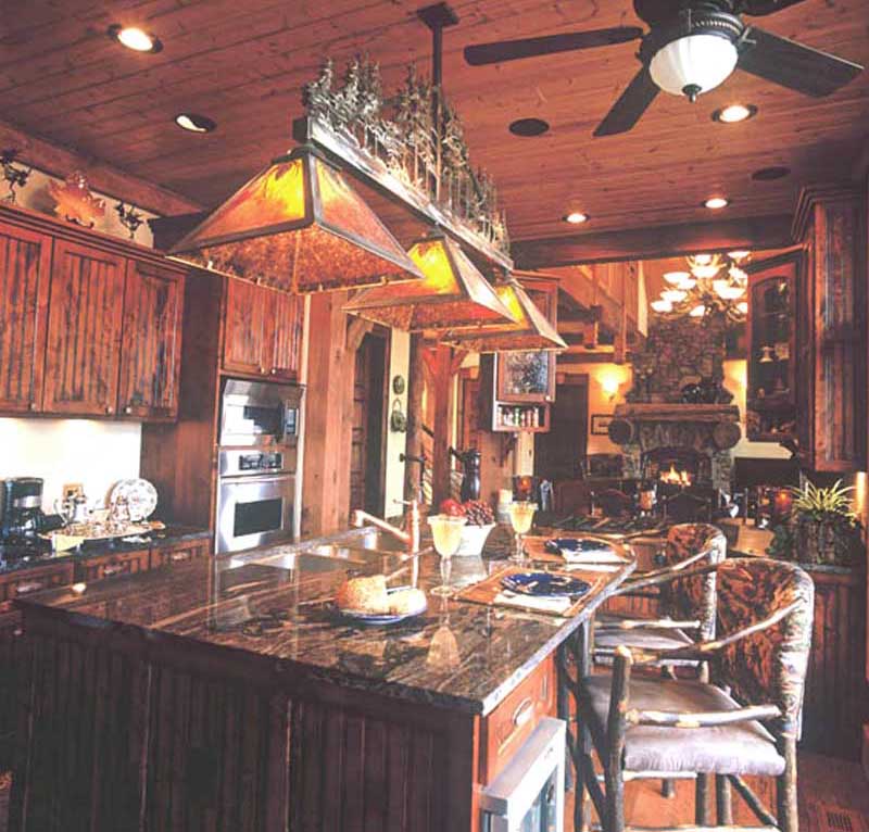 And here we have the complete home and Kitchen installation.  Note how Merry's granite slab selection harmonizes well with the stain on the alderwood cabinetry.